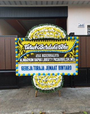 Papan Bunga Duka di Kampung Rawa